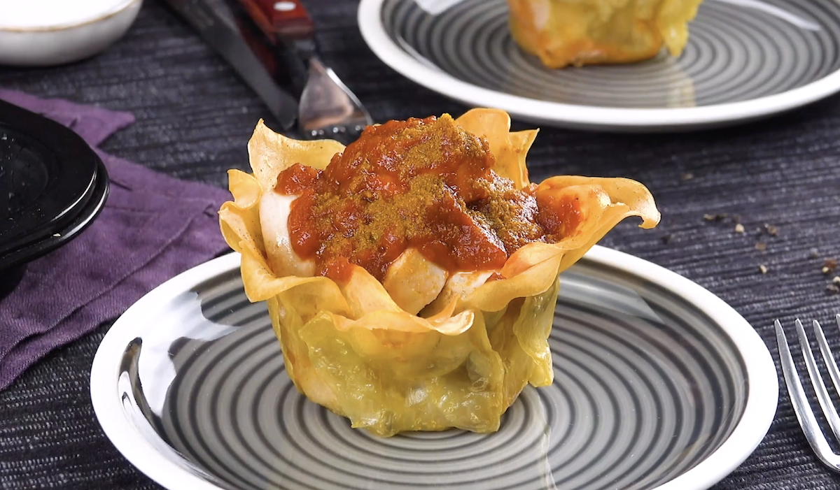 Kartoffel-Körbchen gefüllt mit Curry Wurst